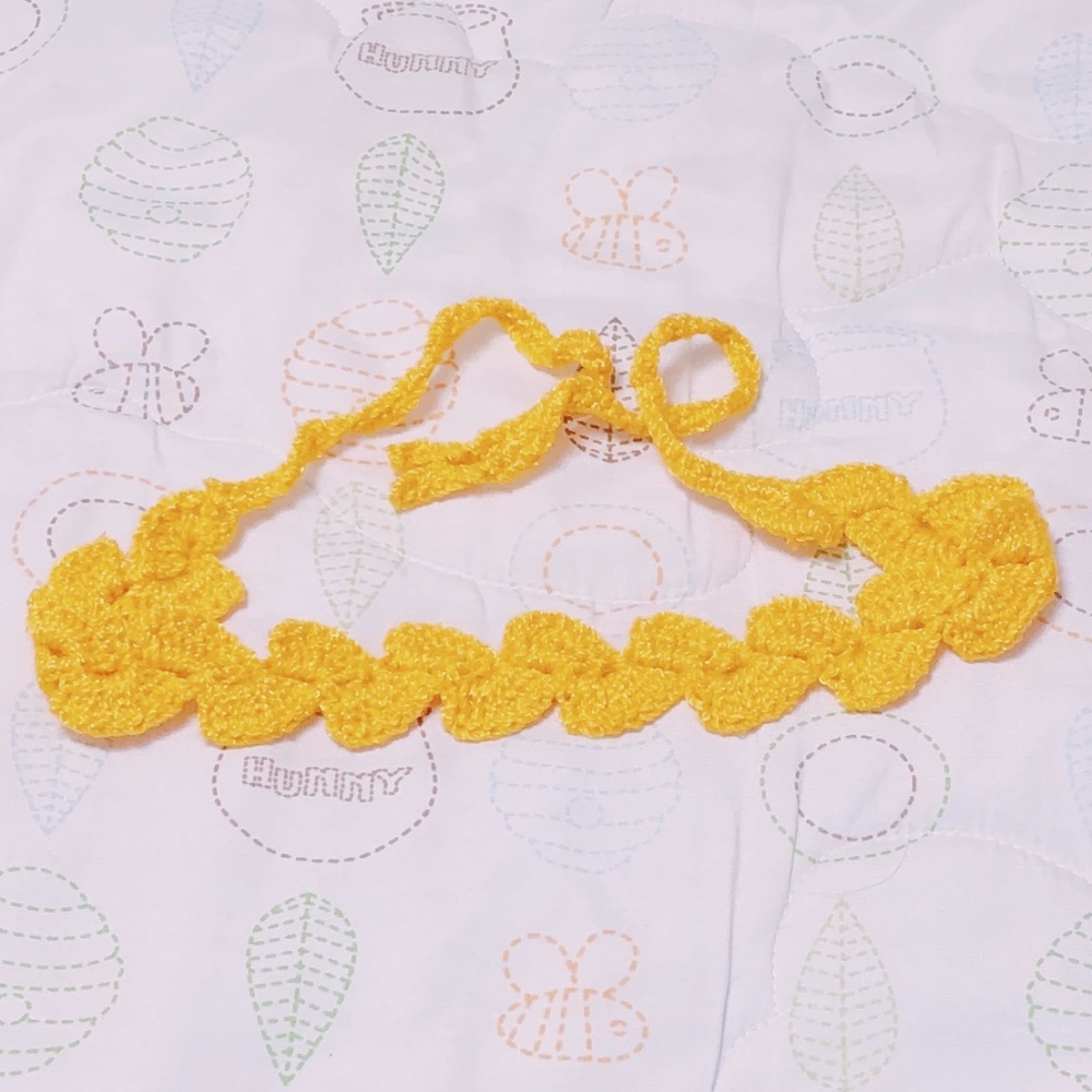 - crochet tieback headband in yellow